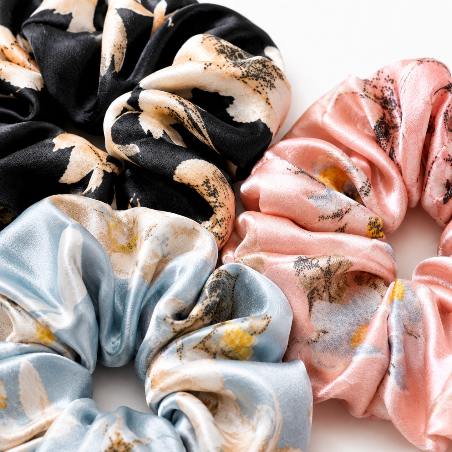 Amber Bloom, Evergreen, and Midnight satin scrunchie 3-pack close up