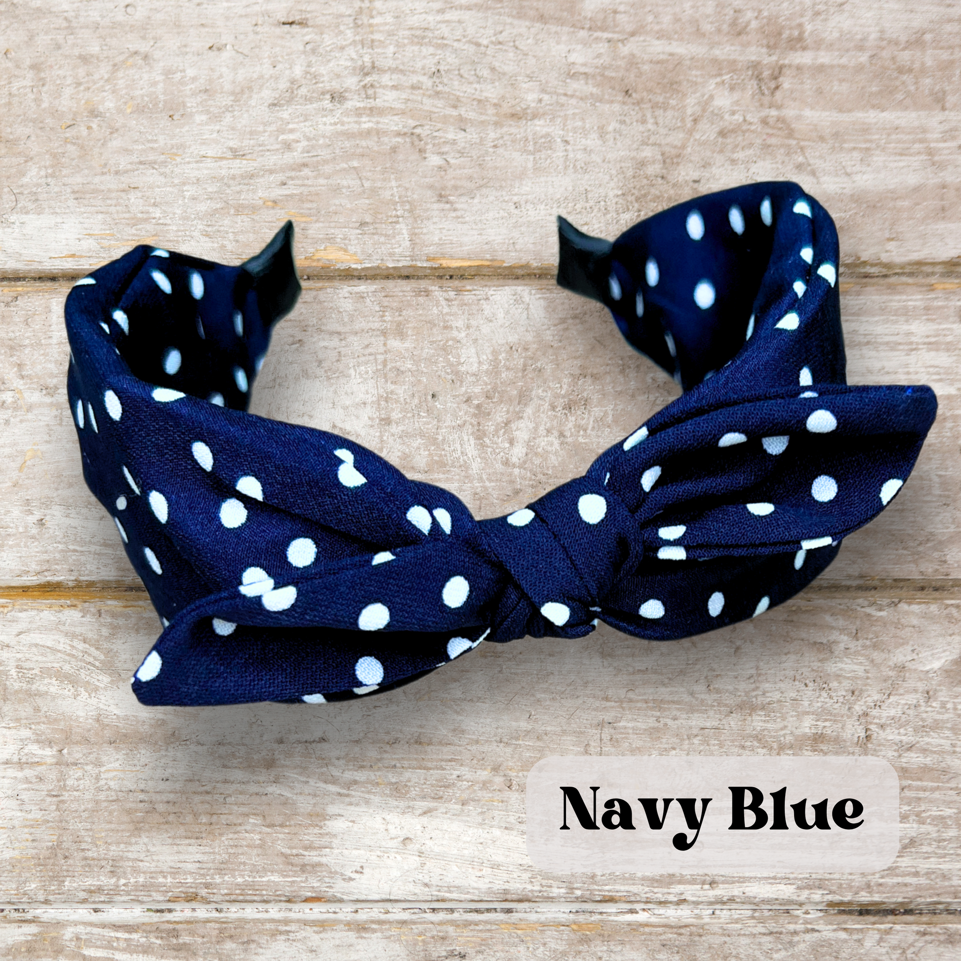 Navy Blue colored Retro rabbit ear headband with twist knot design in vintage colors, perfect for a stylish and classic look
