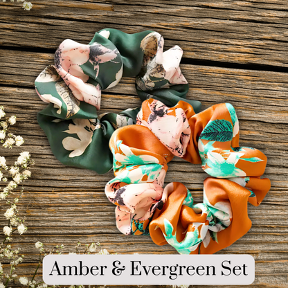 hunter green and amber floral satin scrunch on a wooden plank background. Evergreen petals and Amber Bloom Set.