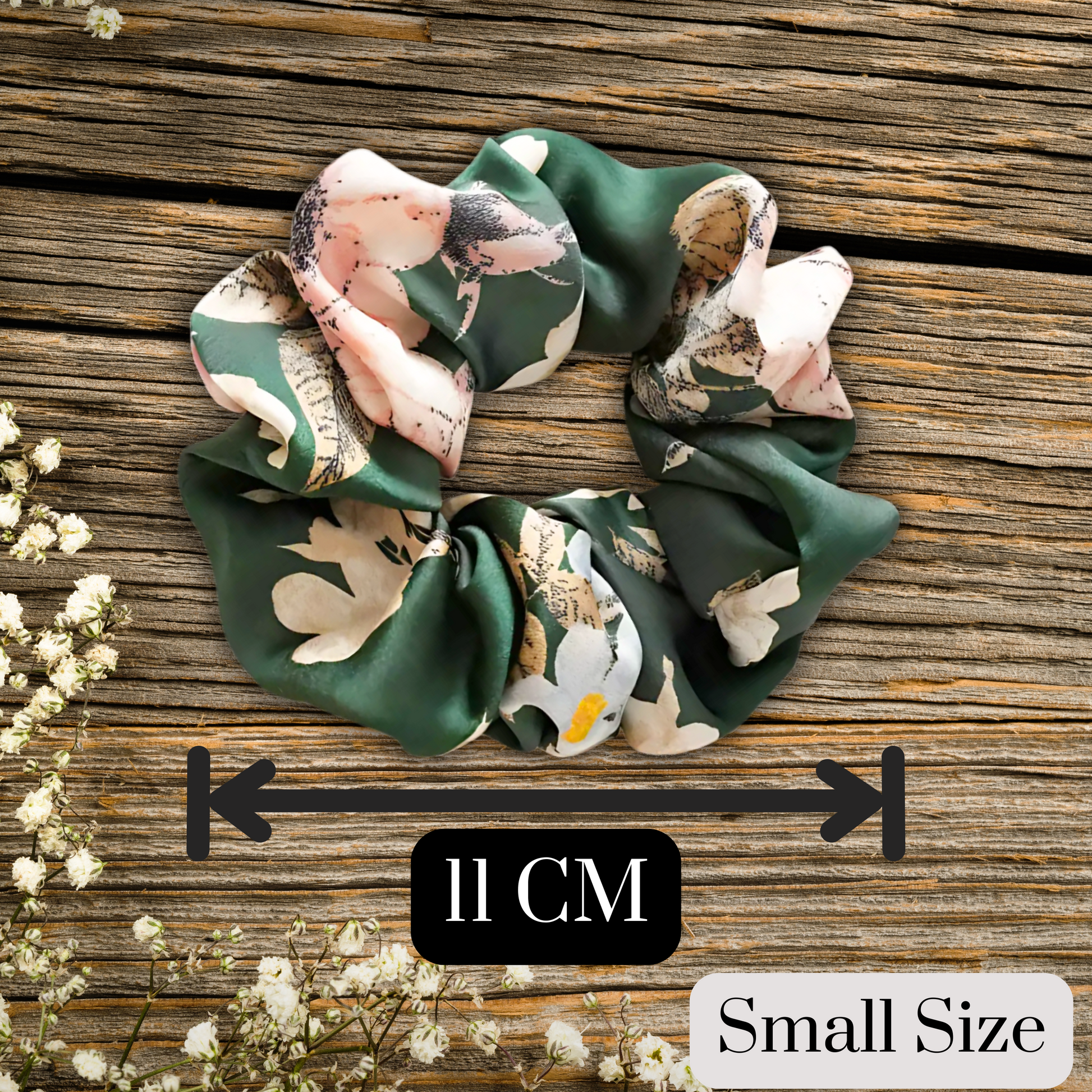 hunter green floral satin scrunch on a wooden plank background measuring 11 centimeters. Evergreen petals