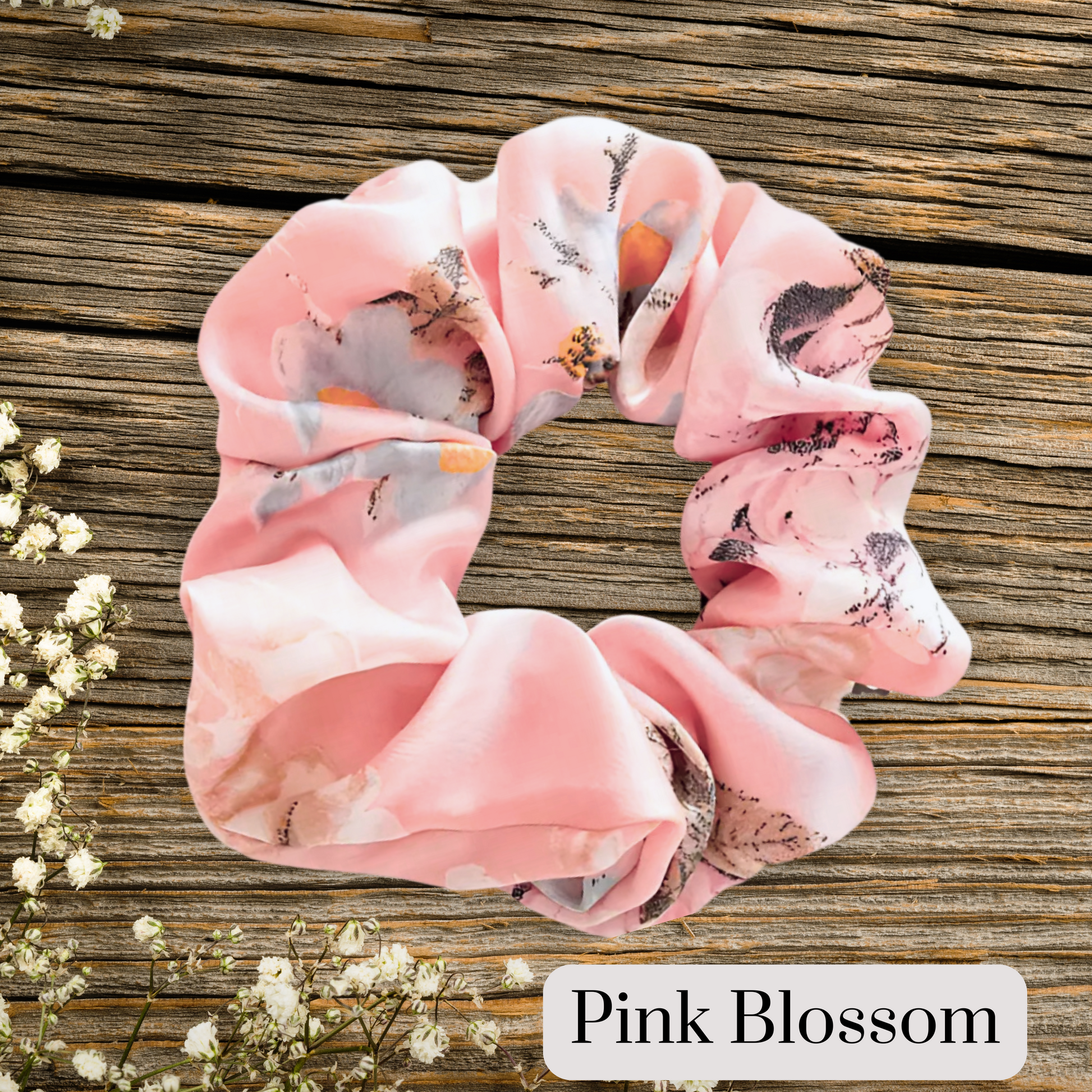 Peach floral satin scrunch on a wooden plank background. Peach Blossom