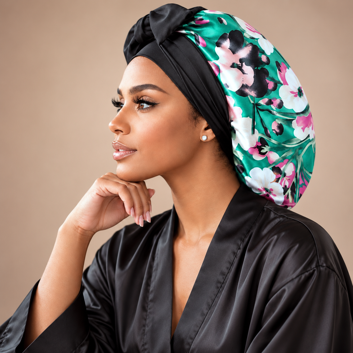 Teal Flowers silk-blend satin bonnet with stretch ties, large size – side profile of the teal floral print, worn with a black satin robe