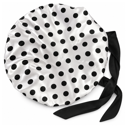 Polka Dot silk-blend satin bonnet with stretch ties – back view laid flat, white satin with black dots and long black ties