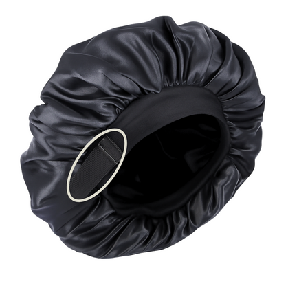Black satin hair bonnet on a white background