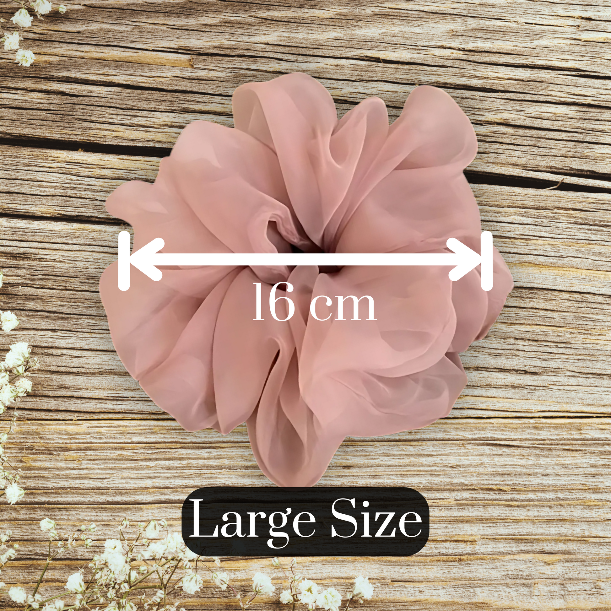 chiffon scrunchie in blush on a large wood table measuring 16 cm in diameter