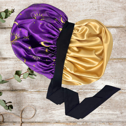 Interior view of the Celestial Plum bonnet highlighting the high-quality gold satin lining and black stretch tie.