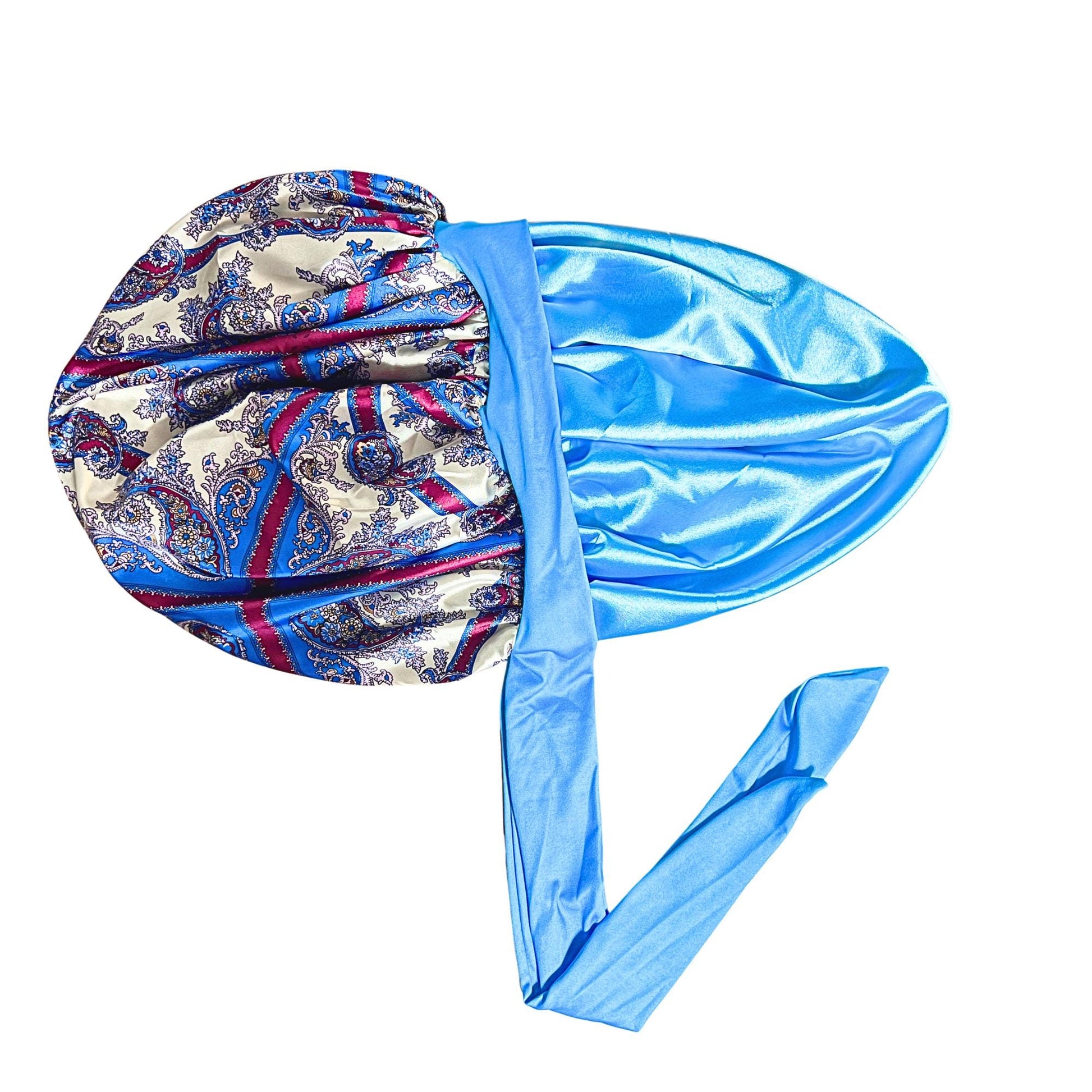 Paisley damask satin stretch-tie bonnet with light blue lining and long adjustable ties photographed flat against a white background.