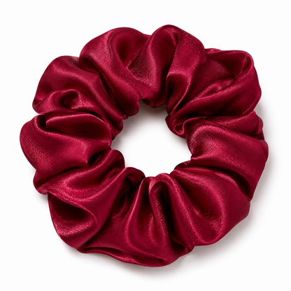 Oversized burgundy satin scrunchie on a clean white background