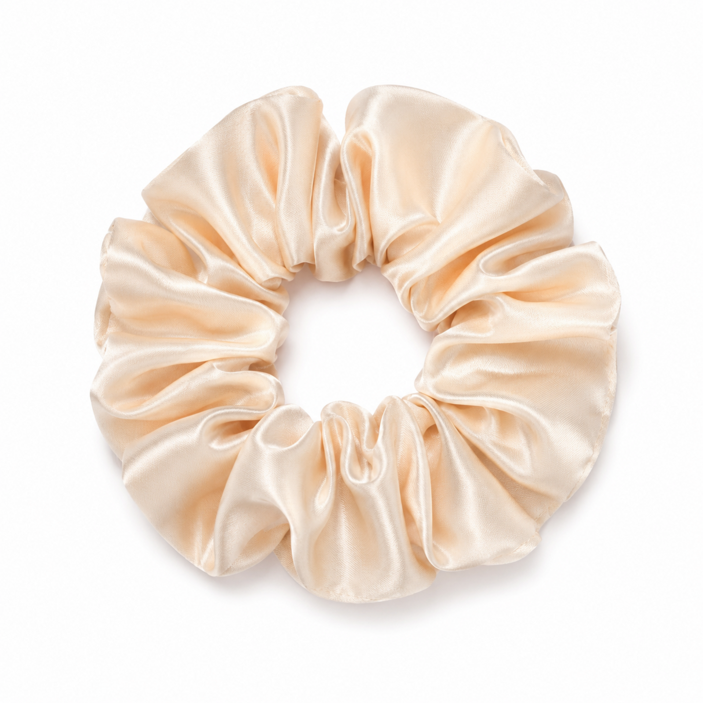 Oversized champagne satin scrunchie on a clean white background
