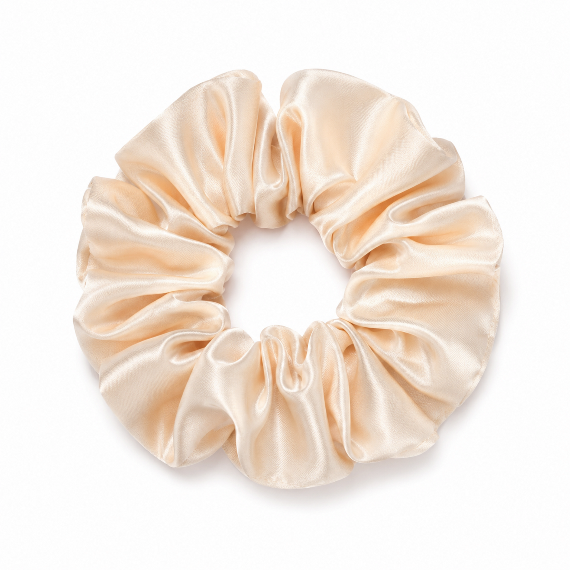 Oversized champagne satin scrunchie on a clean white background