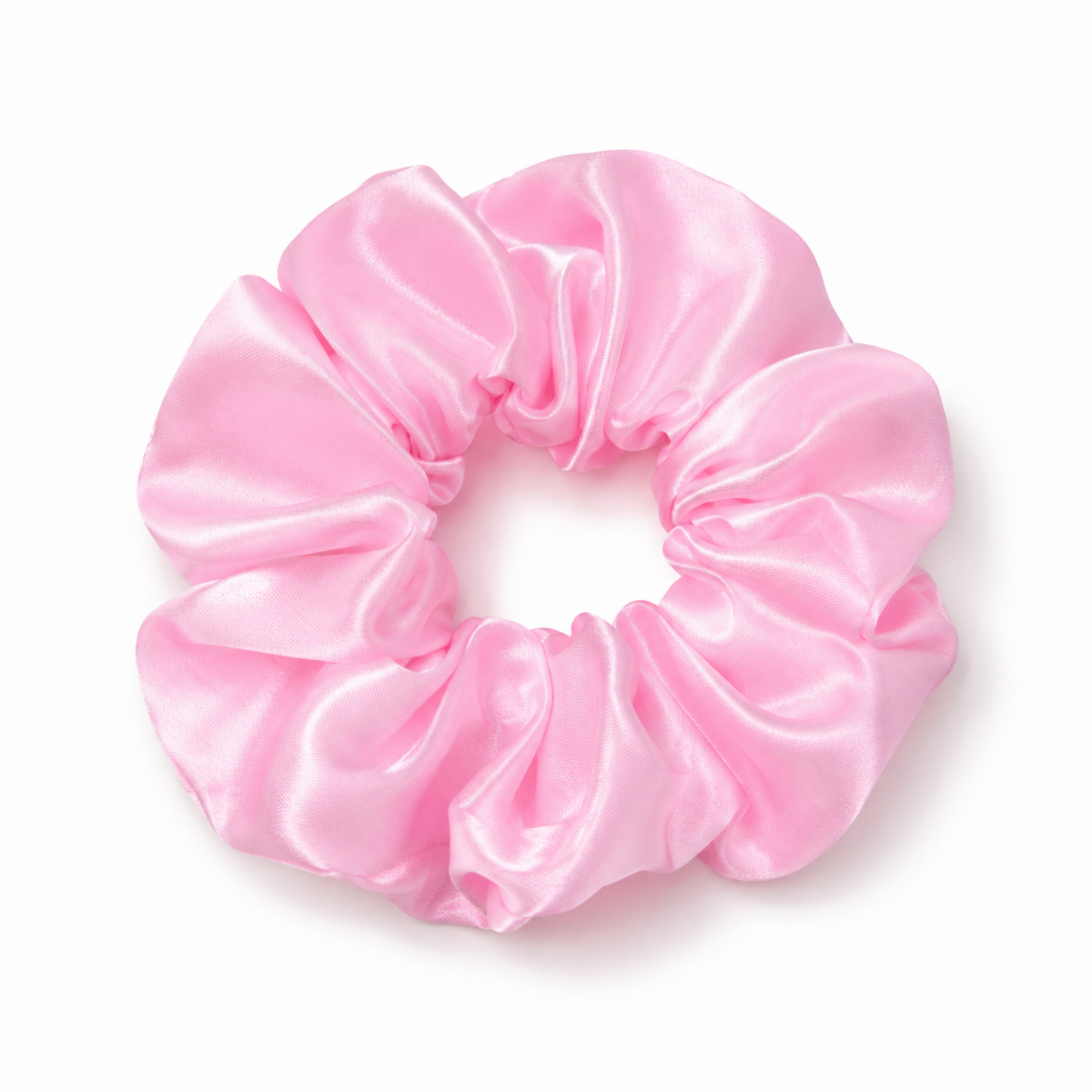 Oversized soft pink satin scrunchie on a clean white background