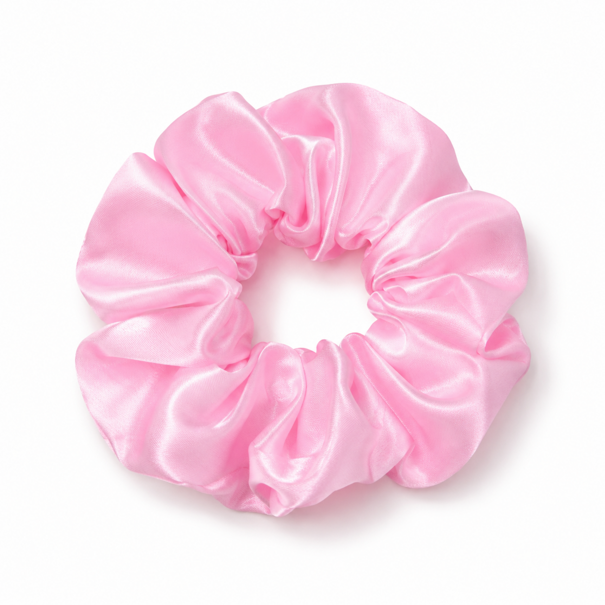 Oversized soft pink satin scrunchie on a clean white background