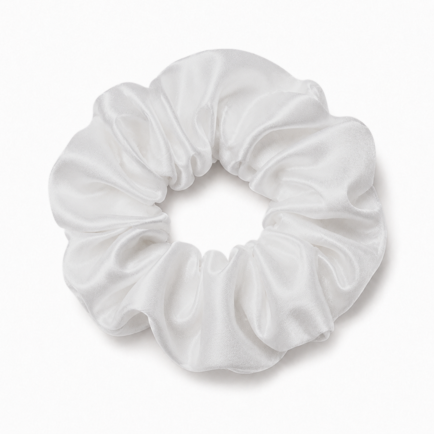 Oversized white satin scrunchie on a clean white background