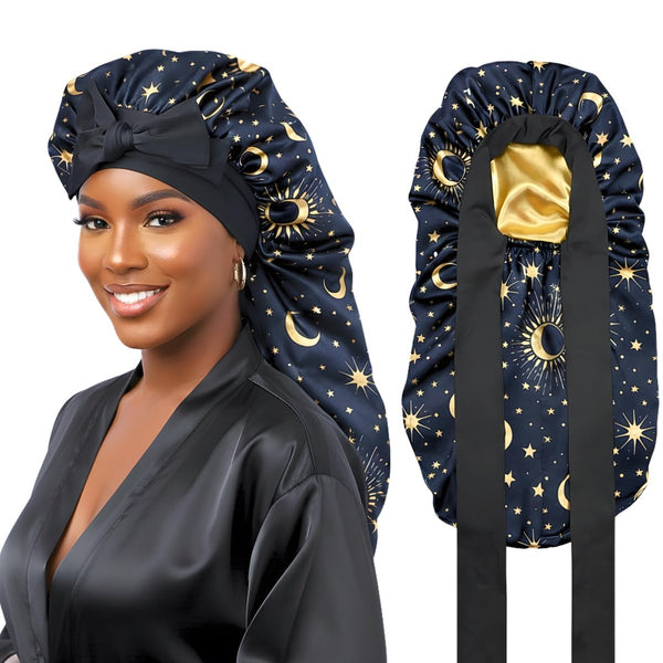 Woman wearing a long celestial print satin bonnet with stretch ties, with back view showing the gold satin interior