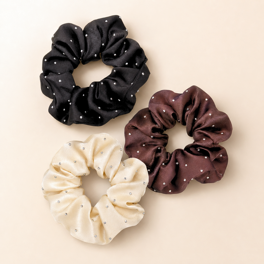 Three rhinestone satin scrunchies in black, mocha brown and cream