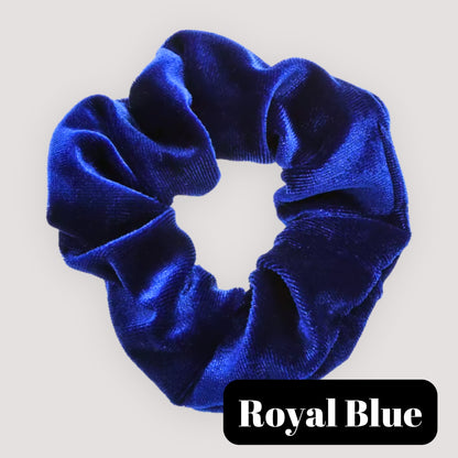 A single Royal Blue handmade velvet scrunchie for damage-free hair styling on a light background, featuring a black label reading 'Royal Blue'.