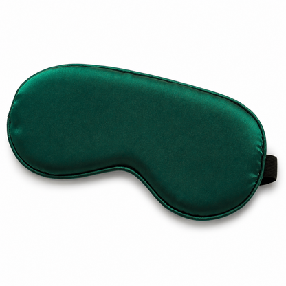 Emerald green satin sleep mask with black elastic strap