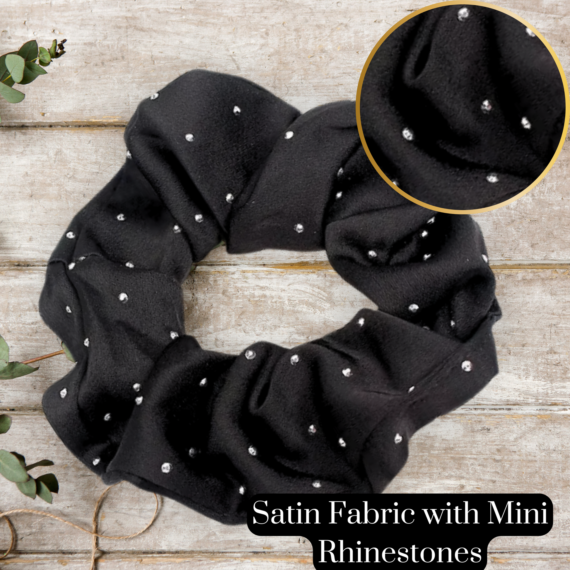 sparkling black hair scrunchie on a wooden table