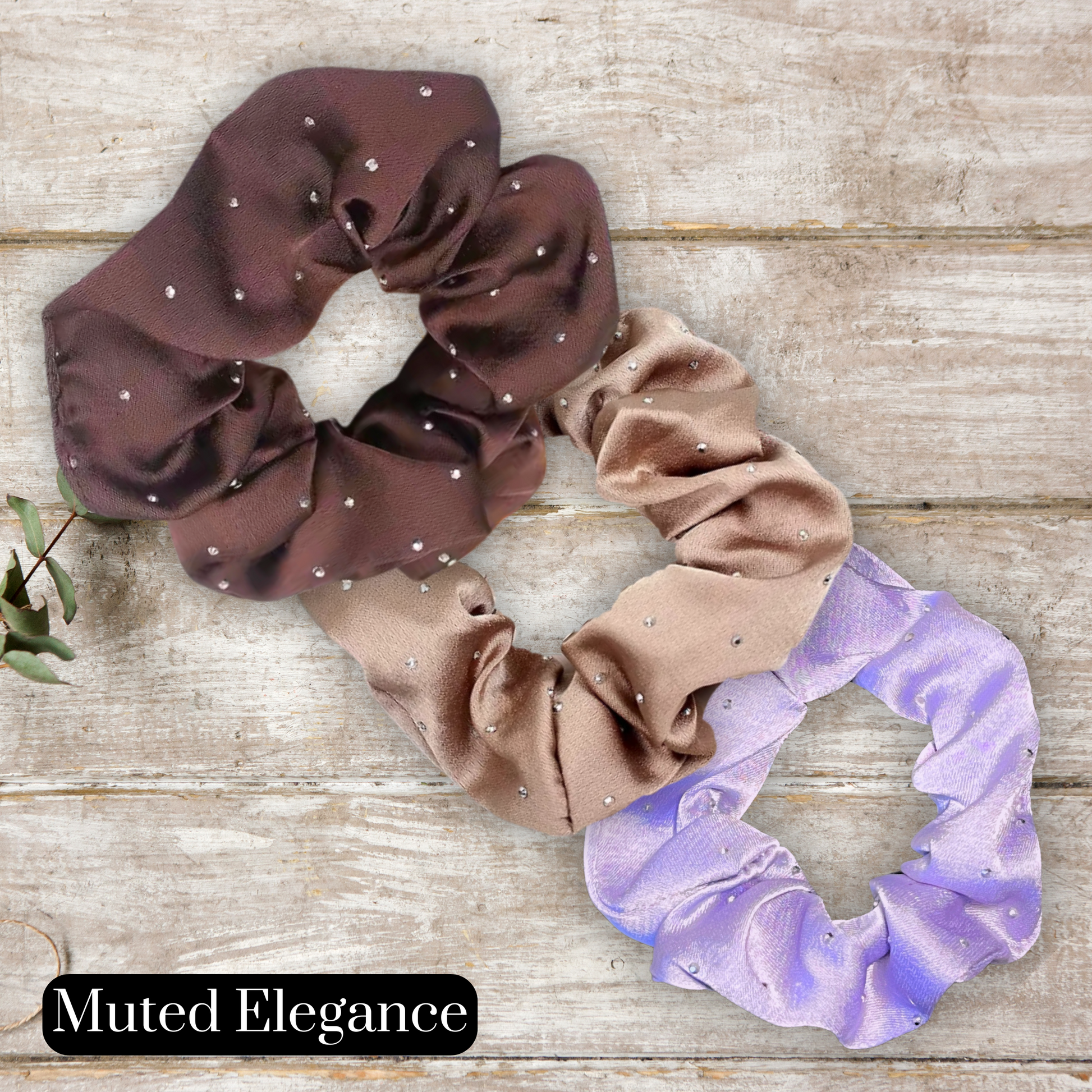 main image of coffee, mocha, and lavender satin rhinestone scrunchies on a wood background