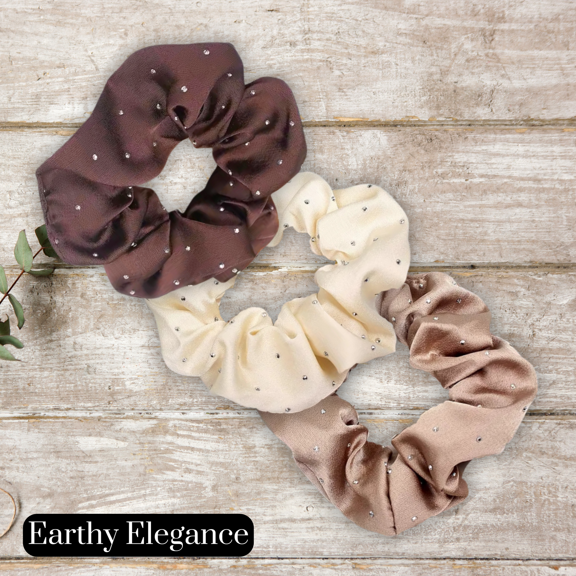 main image of mocha, cream and coffee satin rhinestone scrunchies on a wood background