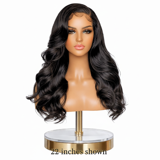 Toya glueless 4x4 HD body wave wig in natural black on mannequin