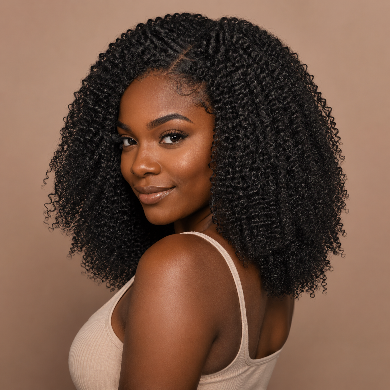 Model wearing natural black virgin Brazilian kinky curly human hair bundles blended with natural hair